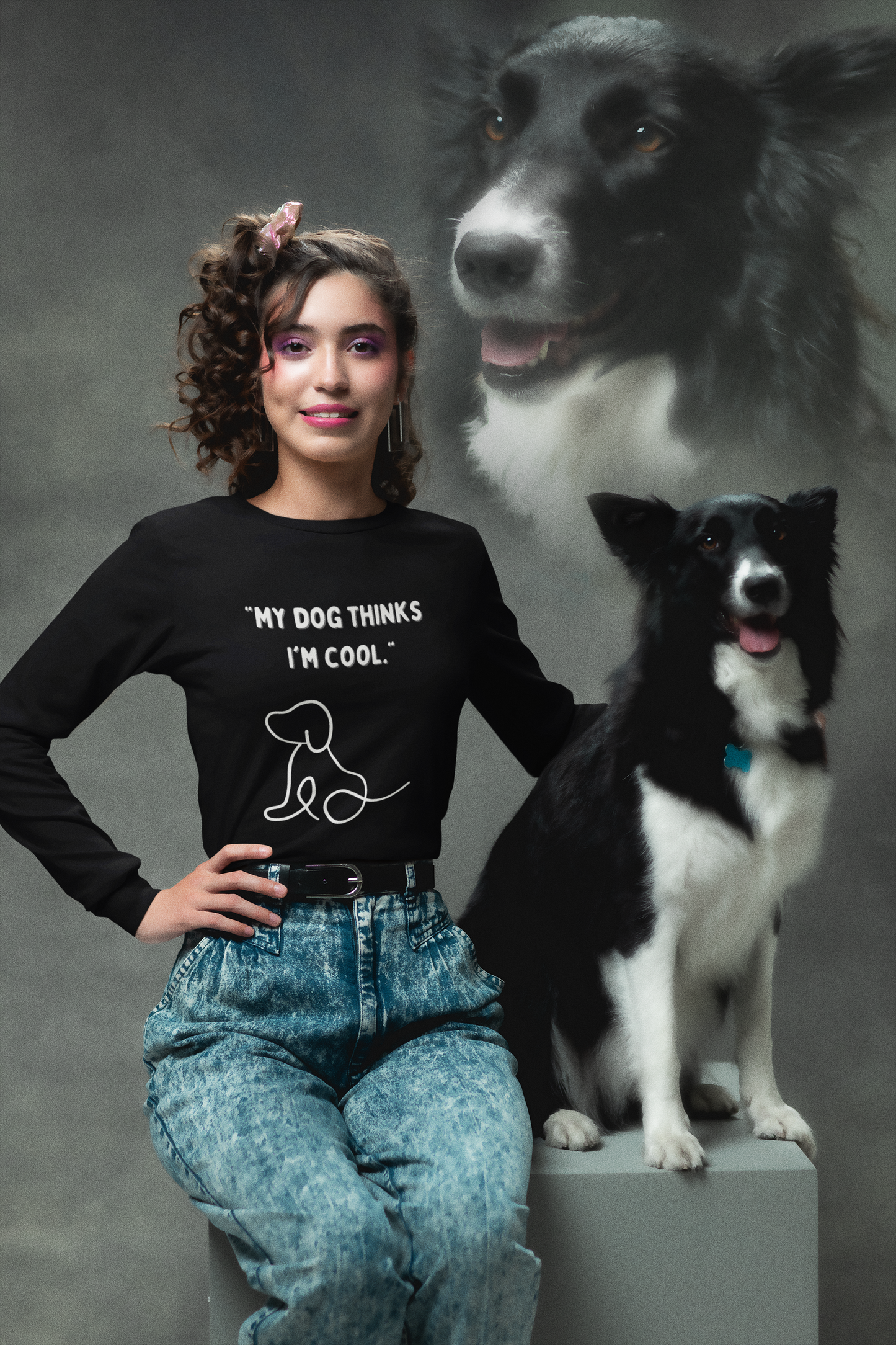 Dog thinks I am cool dog unisex shirt displayed on a woman with a black and white dog in a stylish setting.