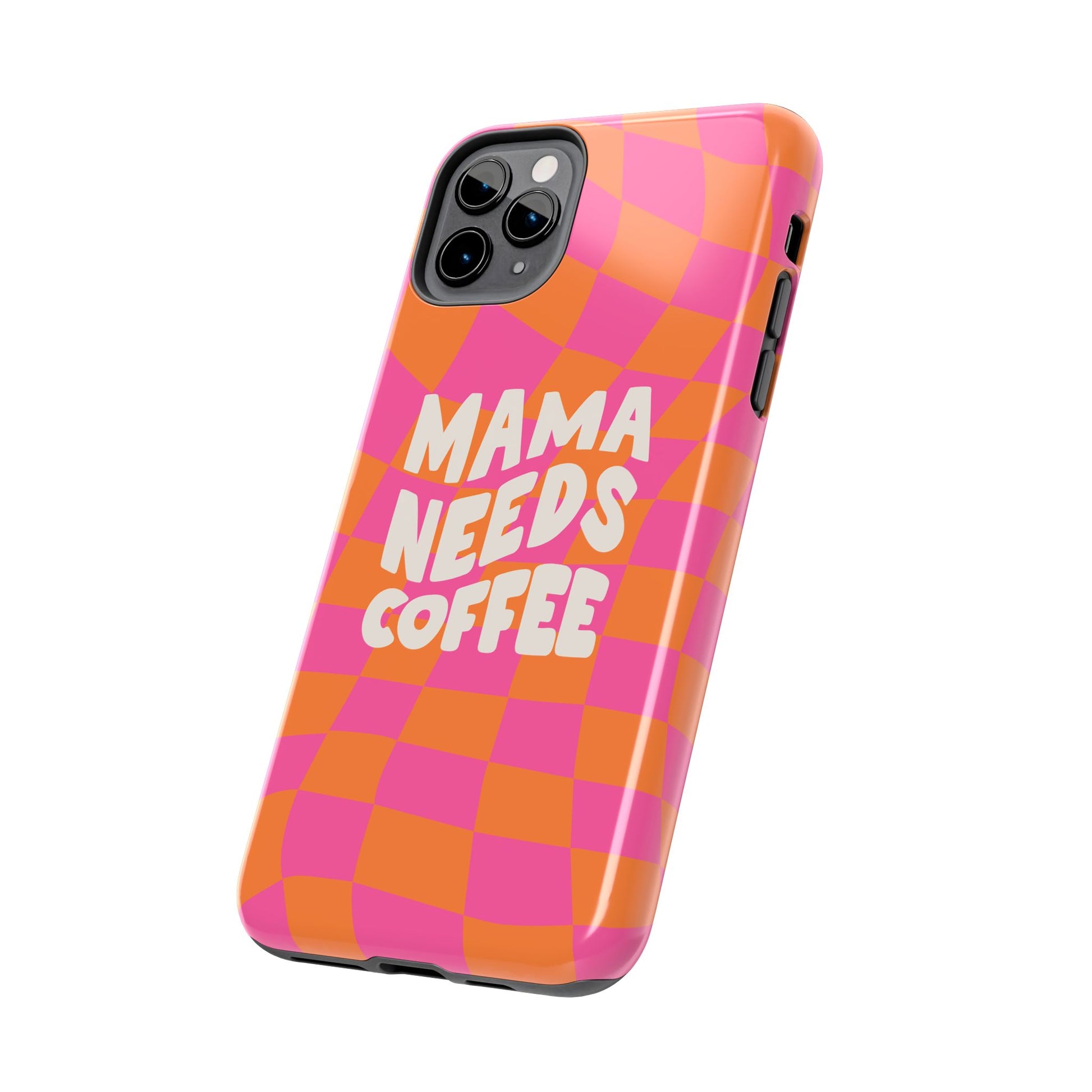 The Mama Needs Coffee Funny Tough Phone Case features a pink and orange checkered pattern with bold "MAMA NEEDS COFFEE" text, designed for triple-camera phones—perfect for caffeine lovers.