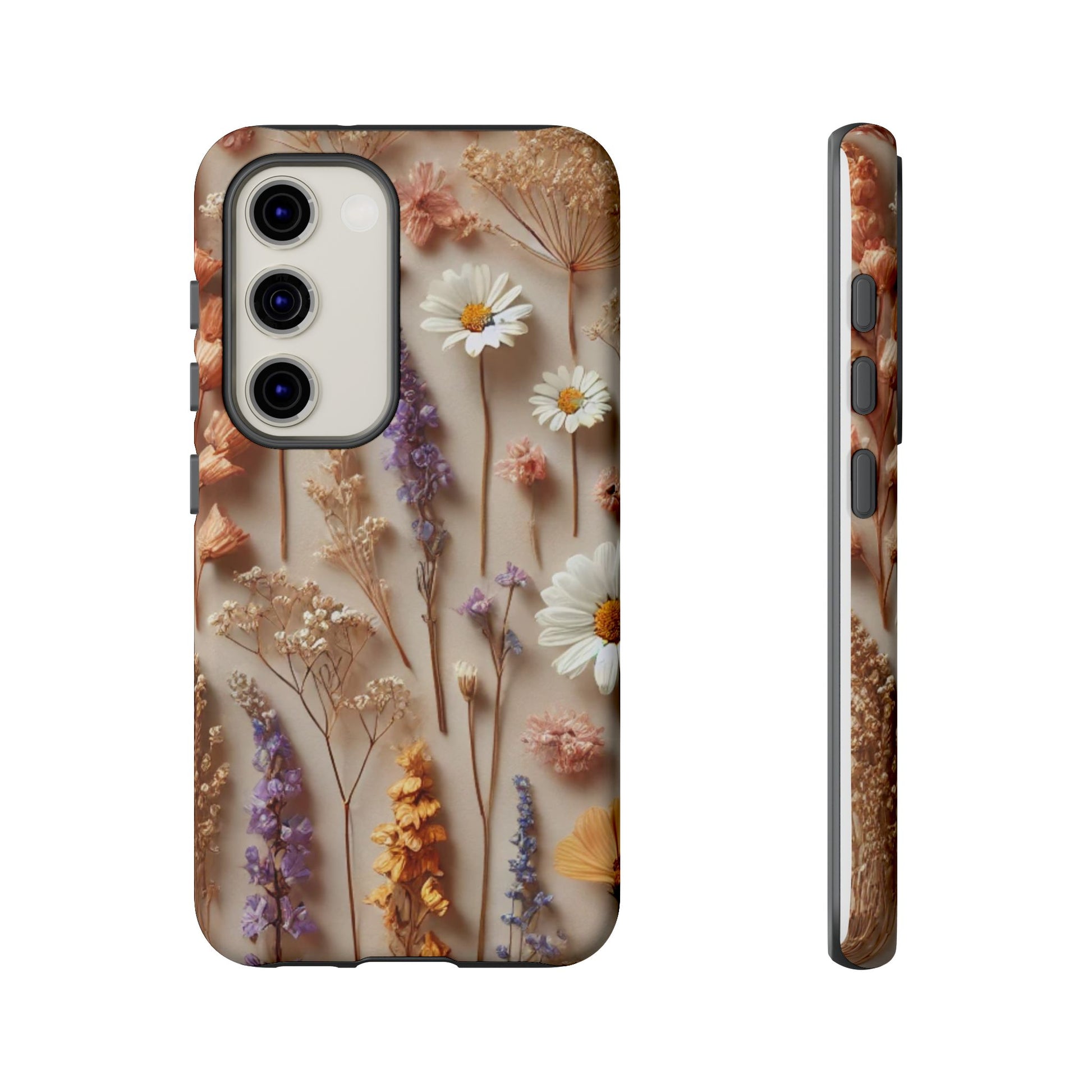 The Printify Aesthetic Pressed Flower Floral Design Phone Cover showcases daisies, lavender, and wildflowers in white, purple, yellow, and orange on a beige background. The phone case is displayed from both back and side views.