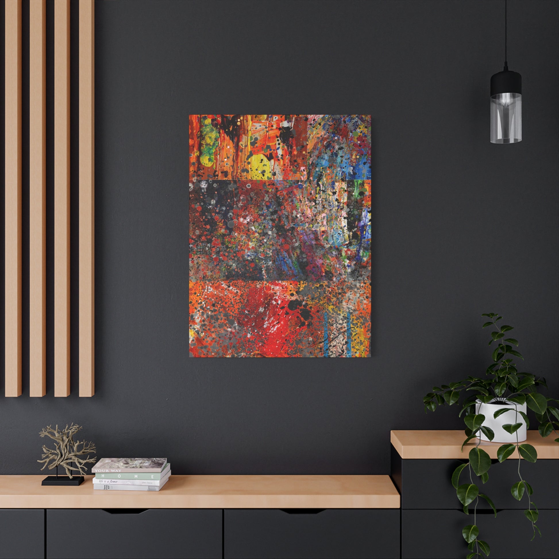 Abstract painting on a dark wall with a wooden console table and decorative items.