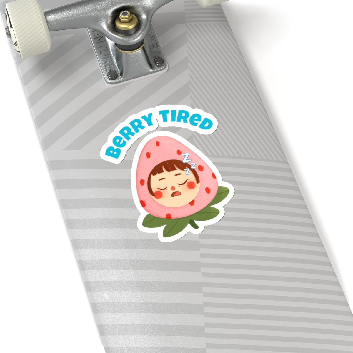 Berry tired vinyl sticker of a sleeping face in a strawberry costume on a skateboard deck