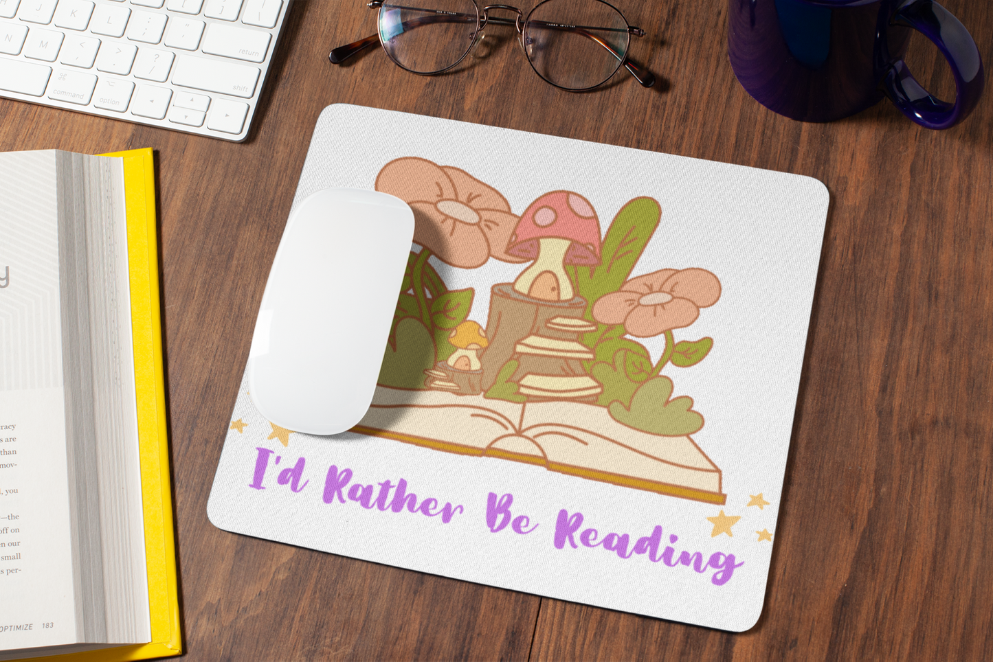 Printify rather be reading fantasy mouse pad . Square home decor mouse pad with mushroom book illustration and purple lettering