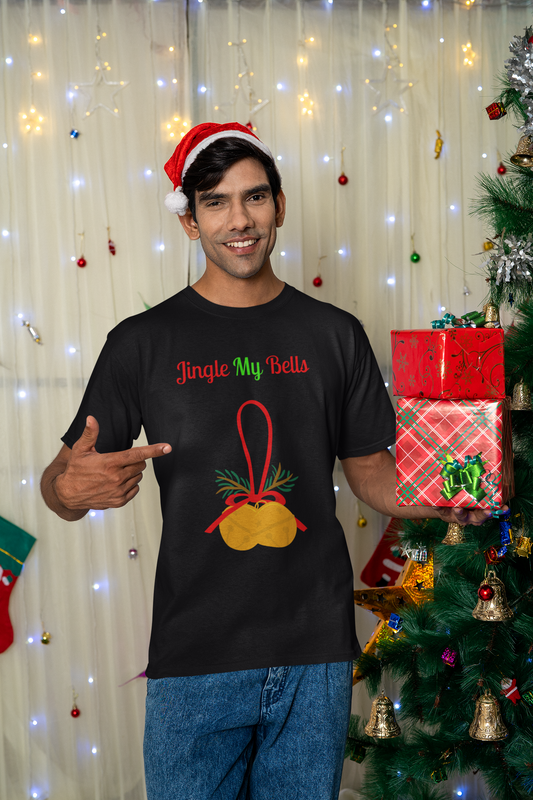 Man wearing black Printify T shirt reading Jingle My Bells with bell graphic Christmas tree naughty holiday shirt for adults