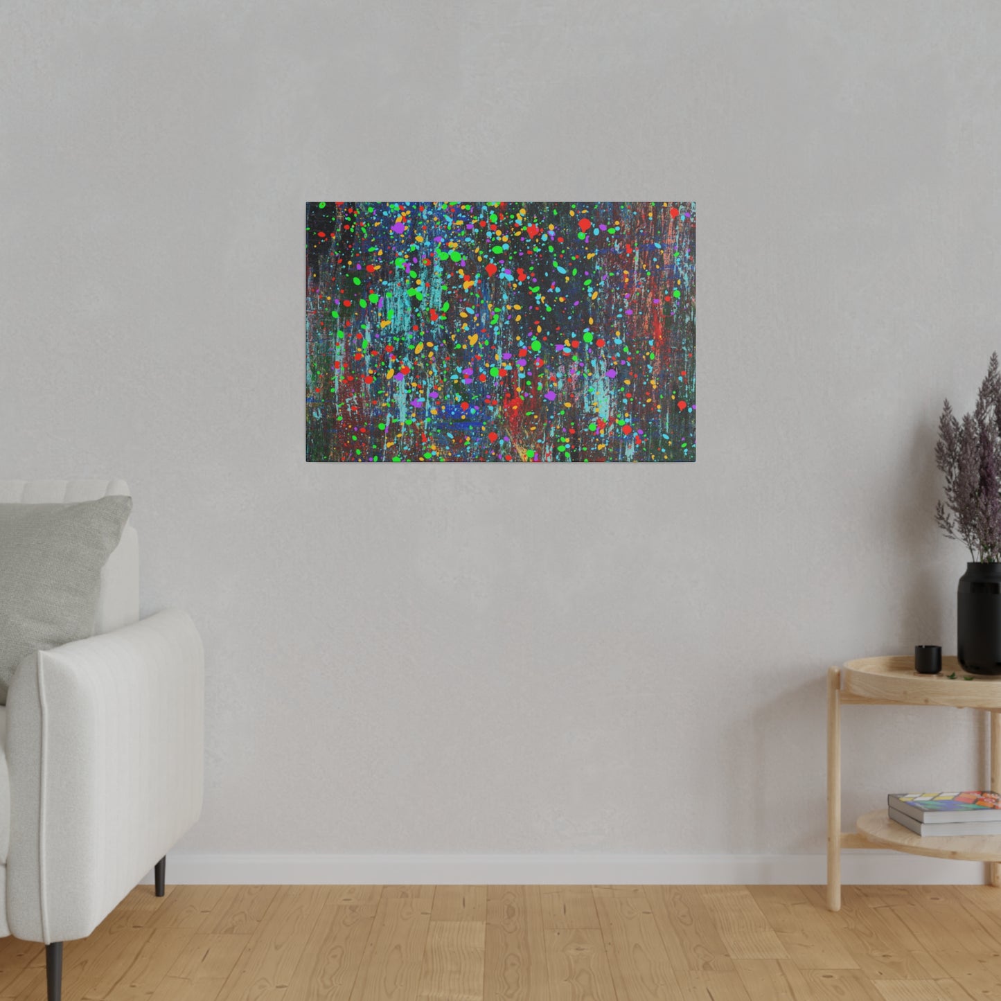 Color drip explosion art canvas print by Printify hanging on a gray wall in modern living room