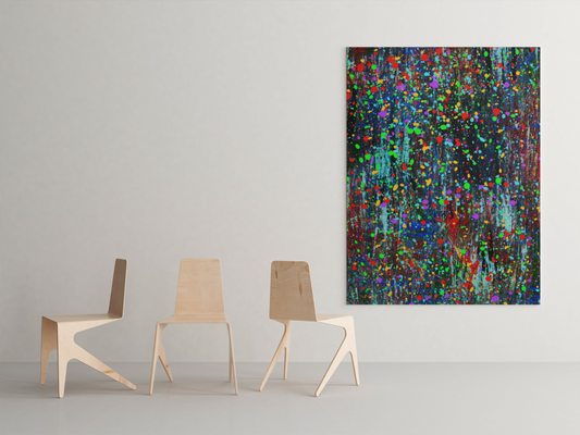 Color drip explosion art canvas print hanging on wall above modern wooden chairs