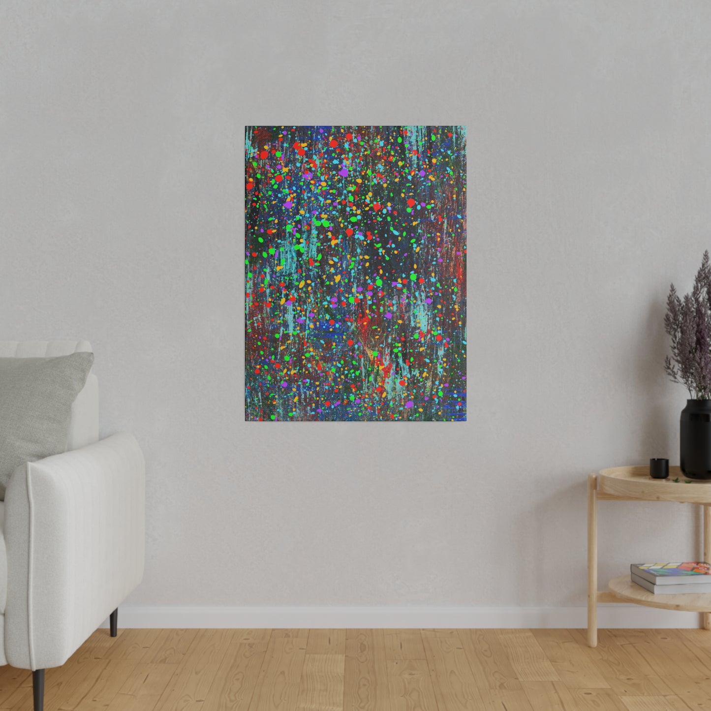 Color drip explosion art canvas print hanging on wall in modern living room setting