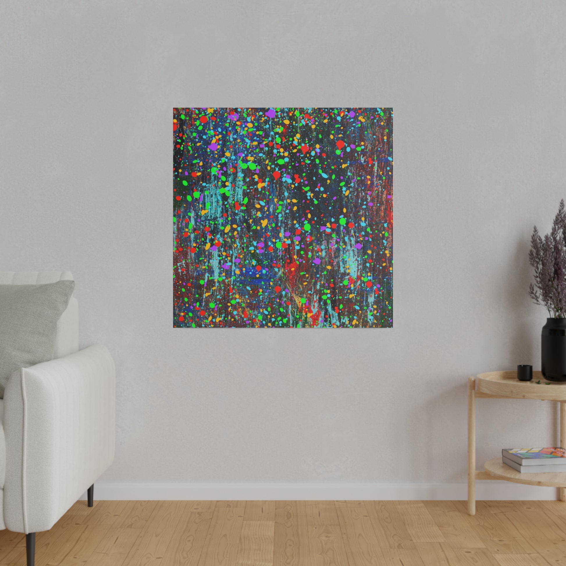 Color drip explosion art canvas print by Printify mounted on wall in modern living room