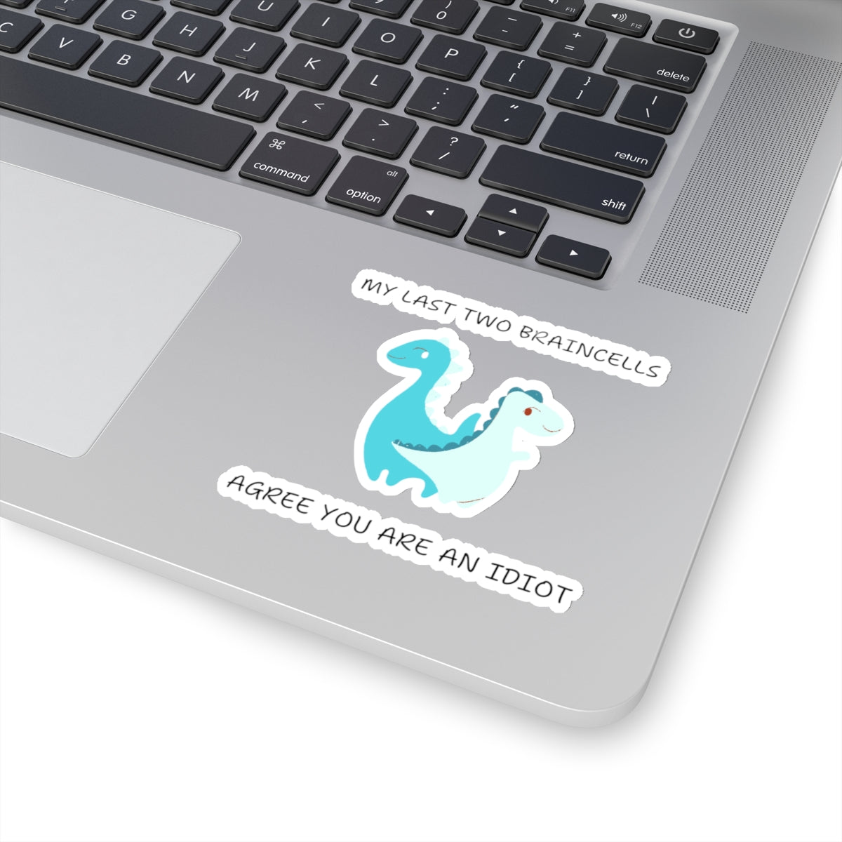 Cute dinosaur meme stickers on a laptop featuring a blue dinosaur and funny text from Printify