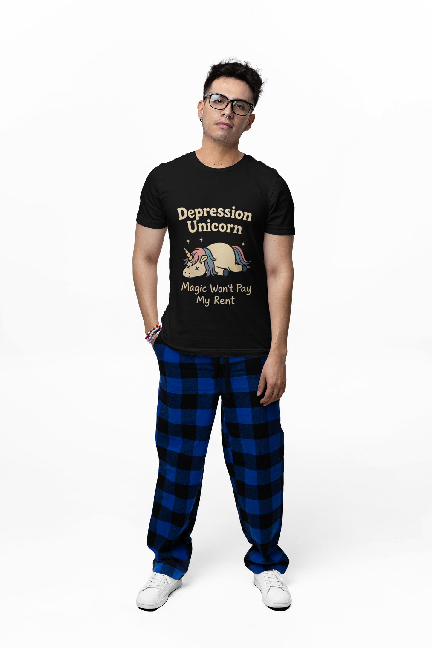 Funny depressed cute unicorn graphic tee featuring a unicorn with the text Magic Won't Pay My Rent
