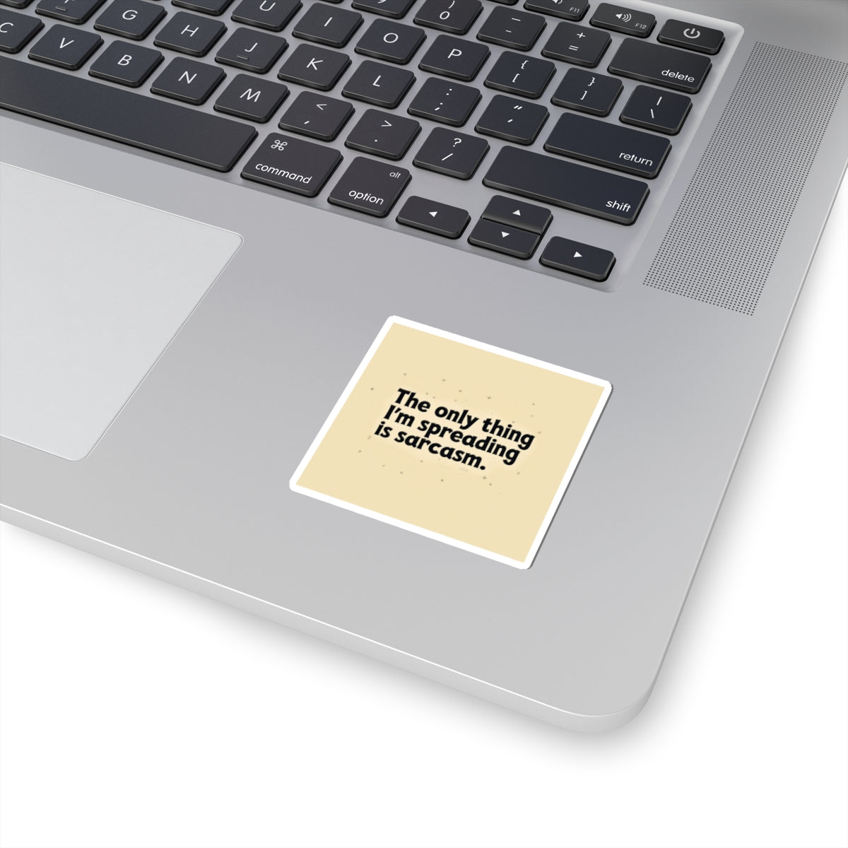 Funny sarcasm stickers on laptop with text The only thing I'm spreading is sarcasm printed by Printify