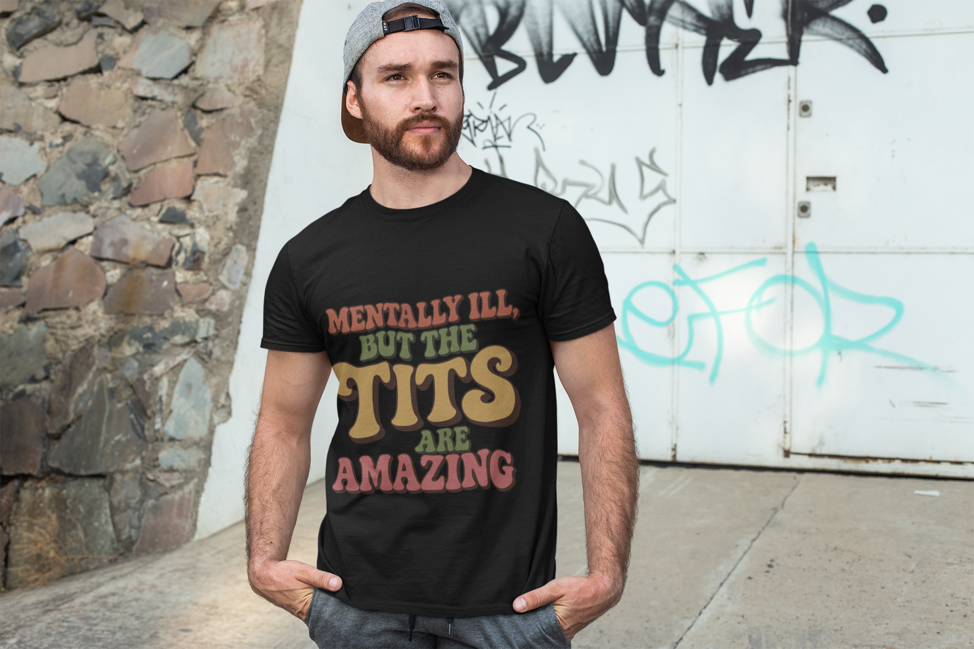 Black funny unisex t-shirt with colorful text saying Mentally Ill But The Tits Are Amazing