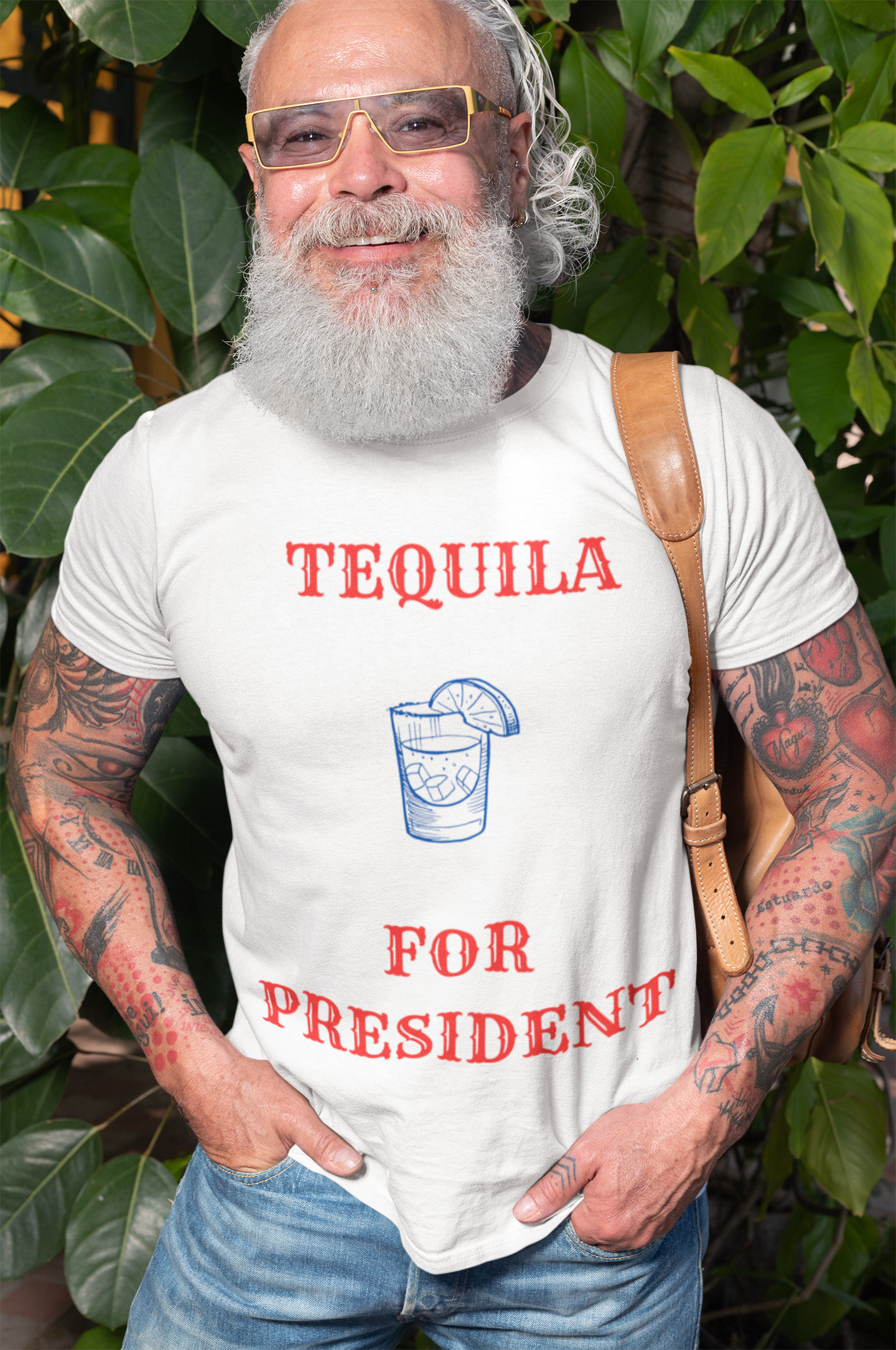 Bearded man wearing white Printify tequila for president political humor  t-shirt with red slogan and blue drink illustration