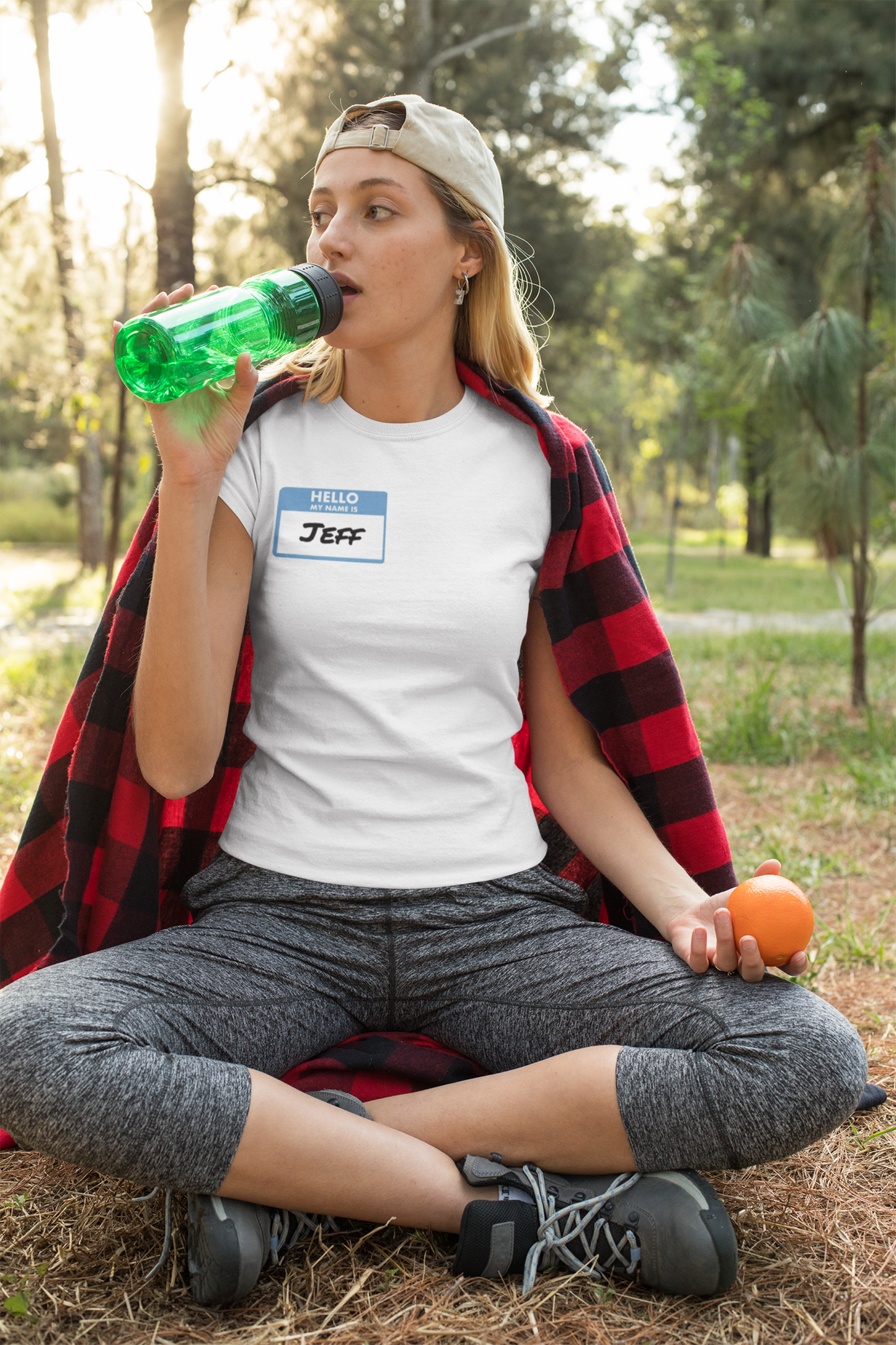 Woman wearing my name is Jeff unisex funny shirt drinking water outdoors with casual athletic wear