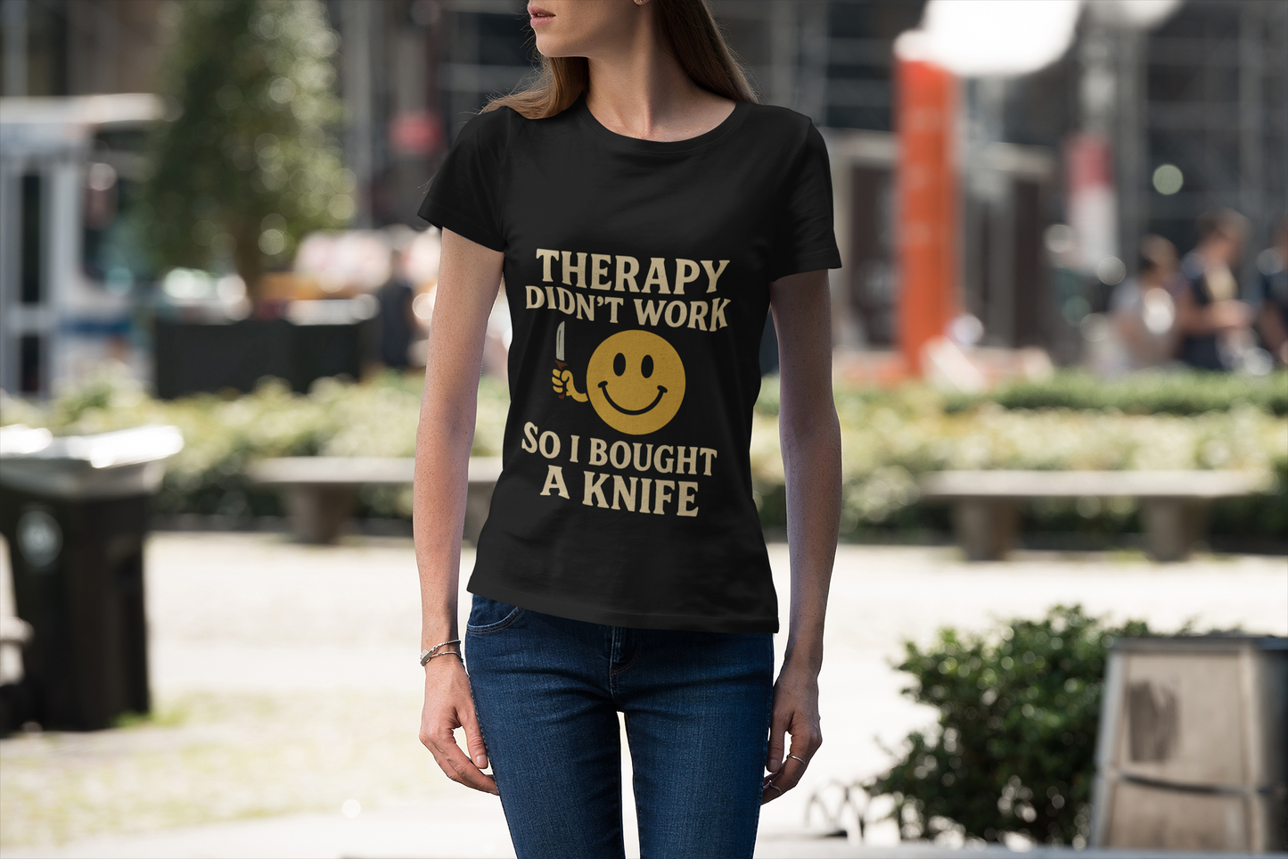 Woman modeling Printify black tee with smiley knife slogan therapy dark joke humor unisex  t shirt .