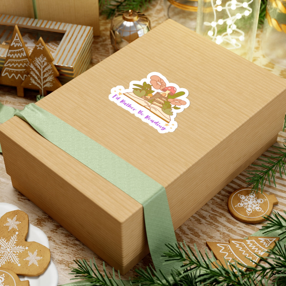Brown gift box with green ribbon featuring an I'd rather be reading cute book lover sticker