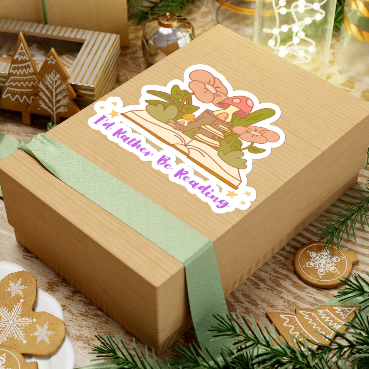 I'd rather be reading cute book lover sticker on a gift box with holiday decorations and cookies
