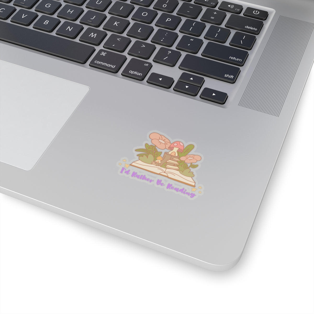 I'd rather be reading cute book lover sticker on silver laptop near keyboard from Printify