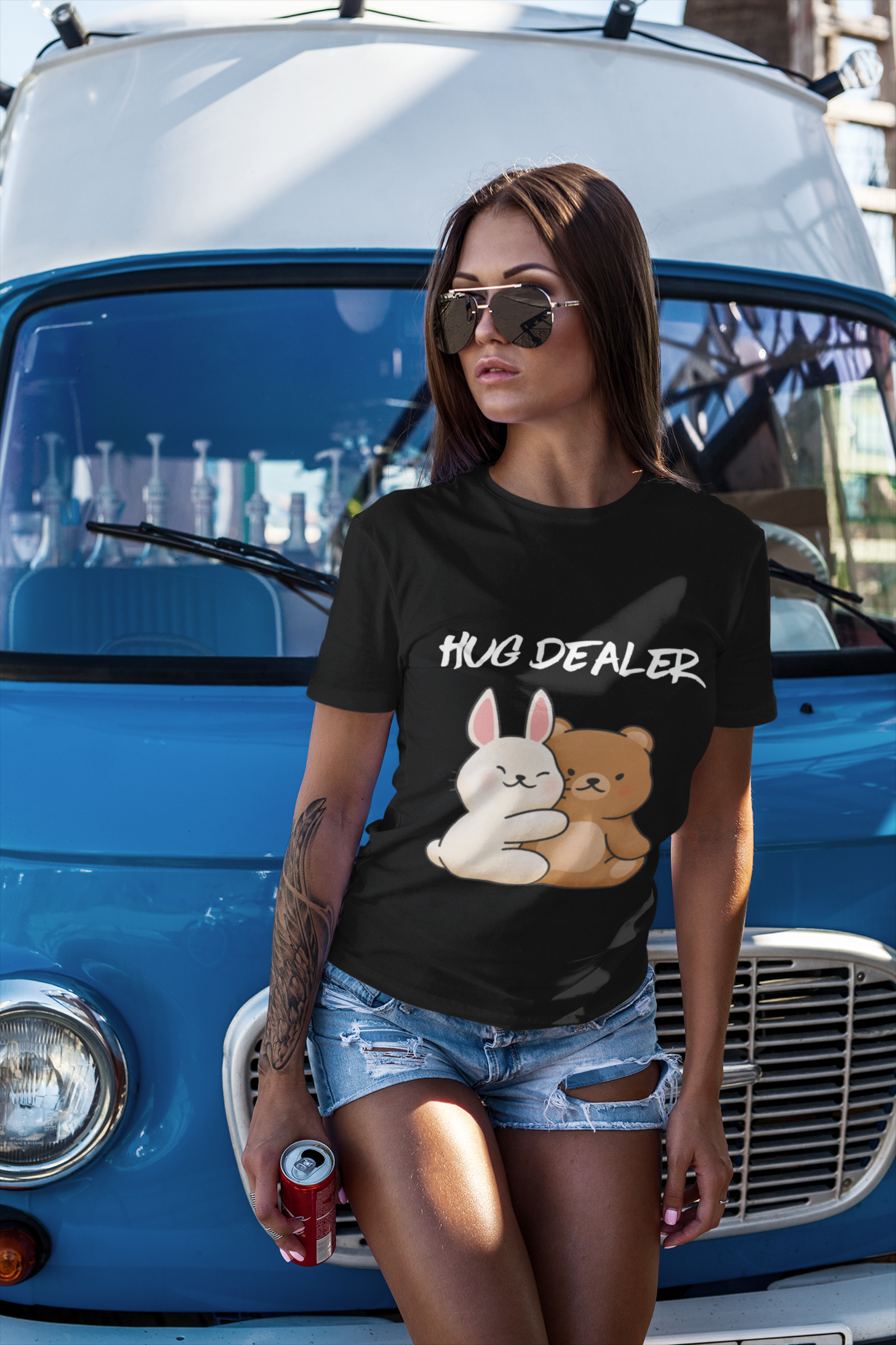 hug dealer kawaii t-shirt on woman in black tee with cute bunny and bear hugging graphic by vintage blue van