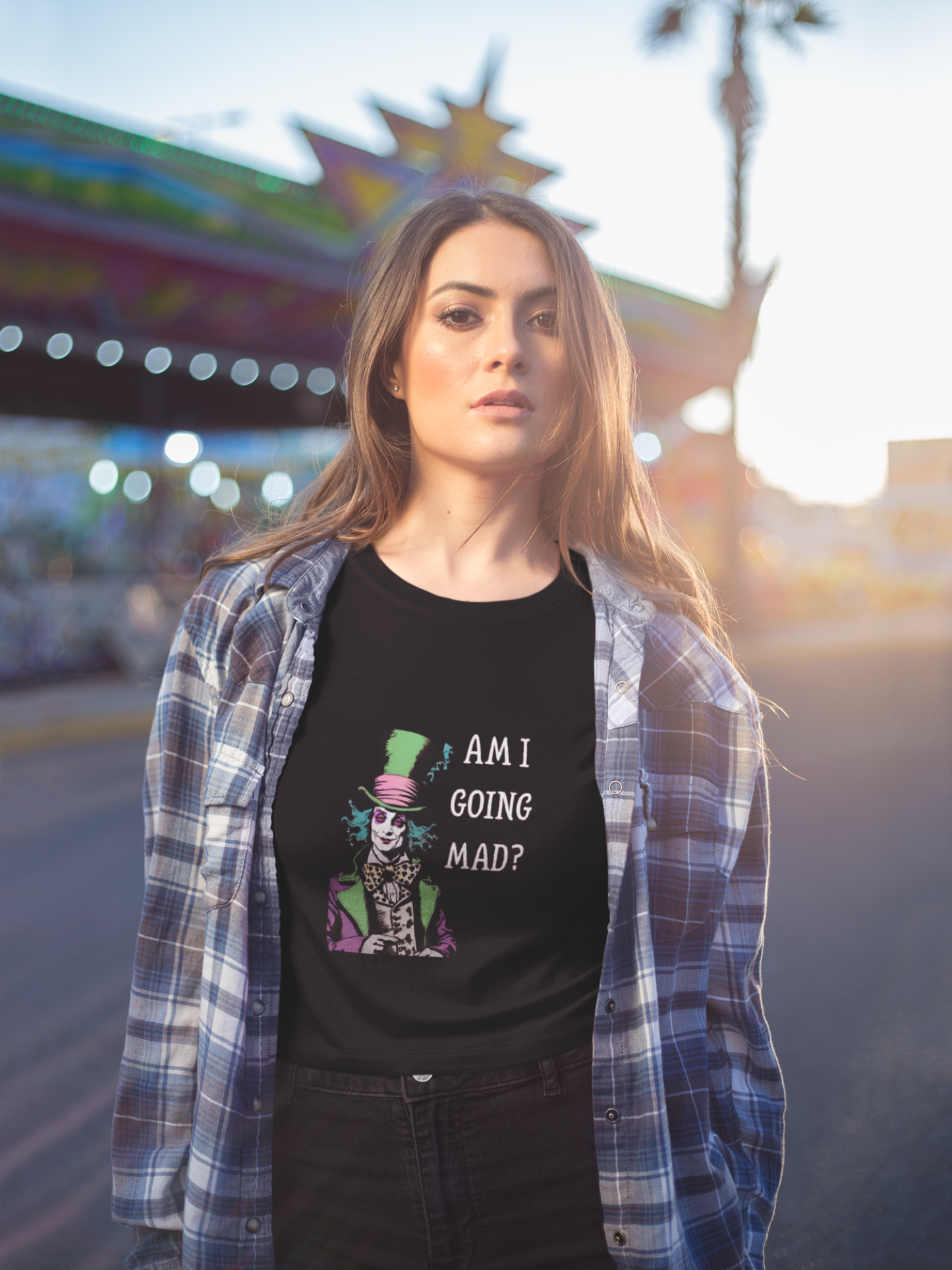 Black mad hatter am i going mad vintage unisex shirt worn by woman with plaid shirt outdoors