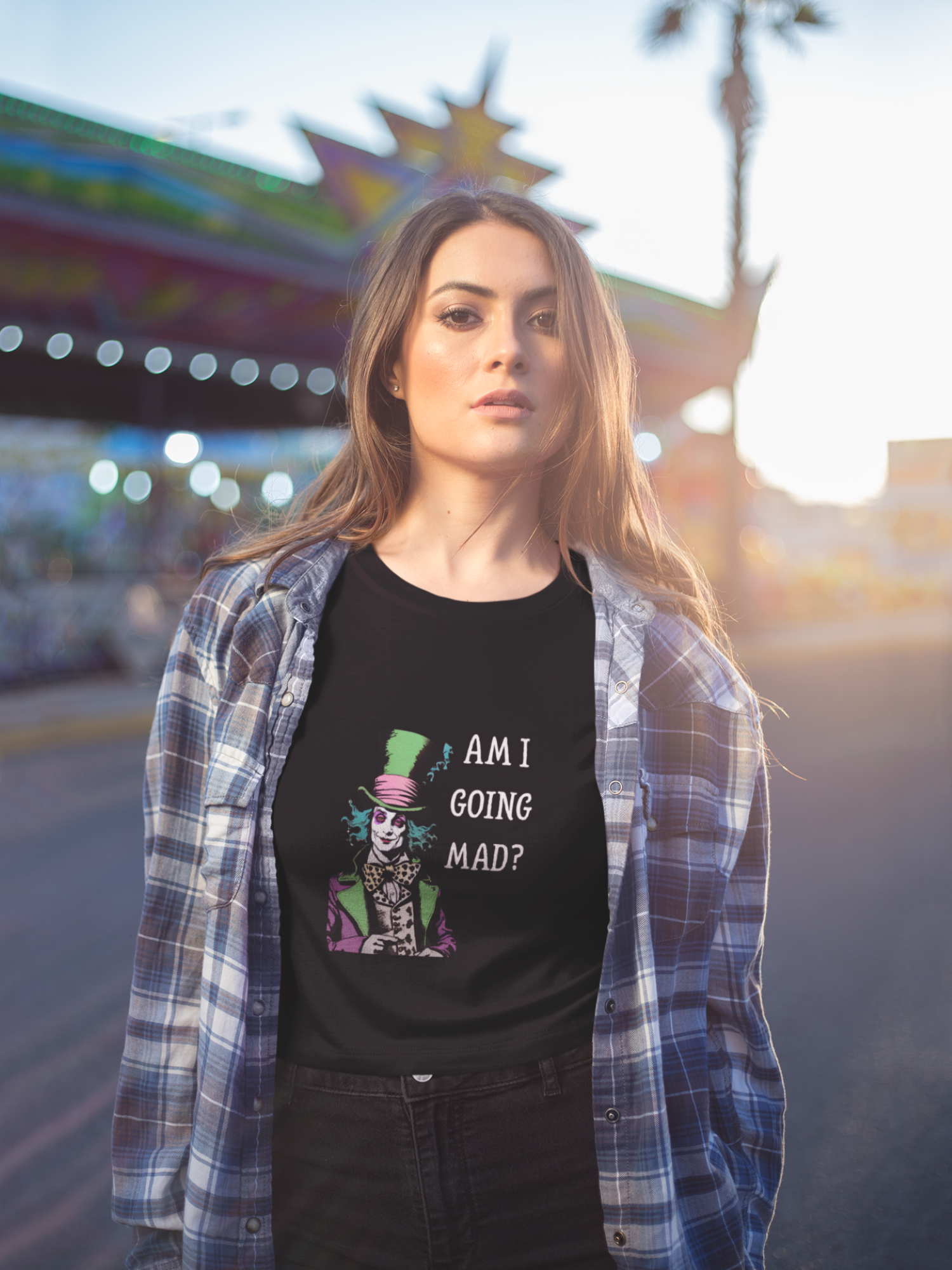 Black mad hatter am i going mad vintage unisex shirt worn by woman with plaid shirt outdoors