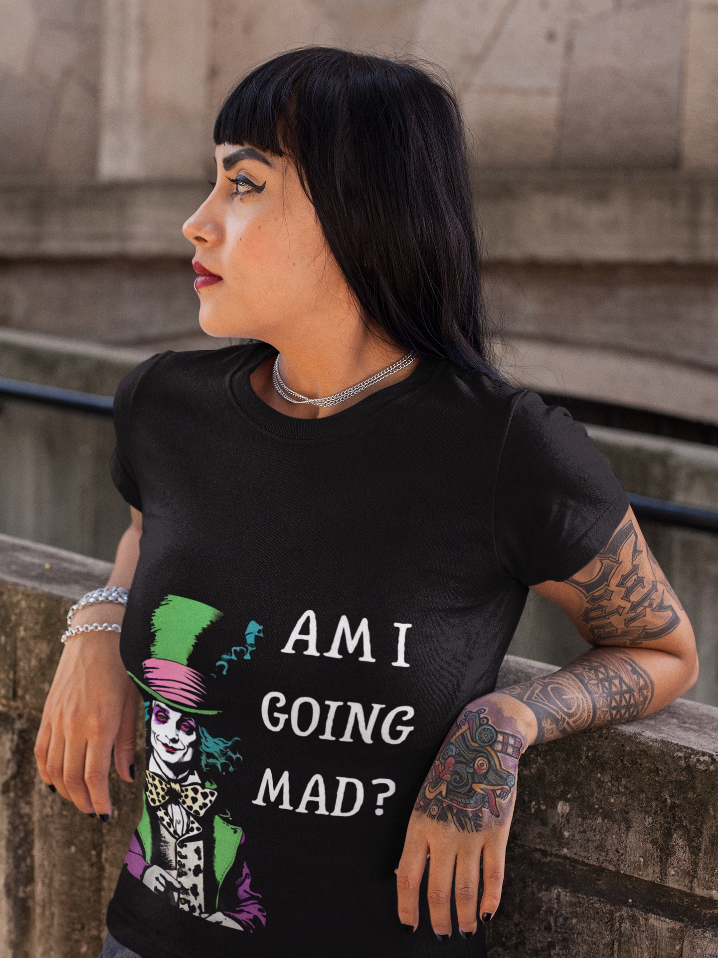 Black mad hatter am i going mad vintage unisex shirt worn by tattooed woman outdoors