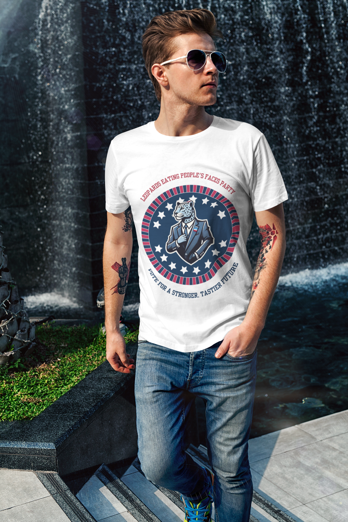 Man wearing Printify white tee with circular graphic of a suited leopard leopards eating people's faces political meme shirt