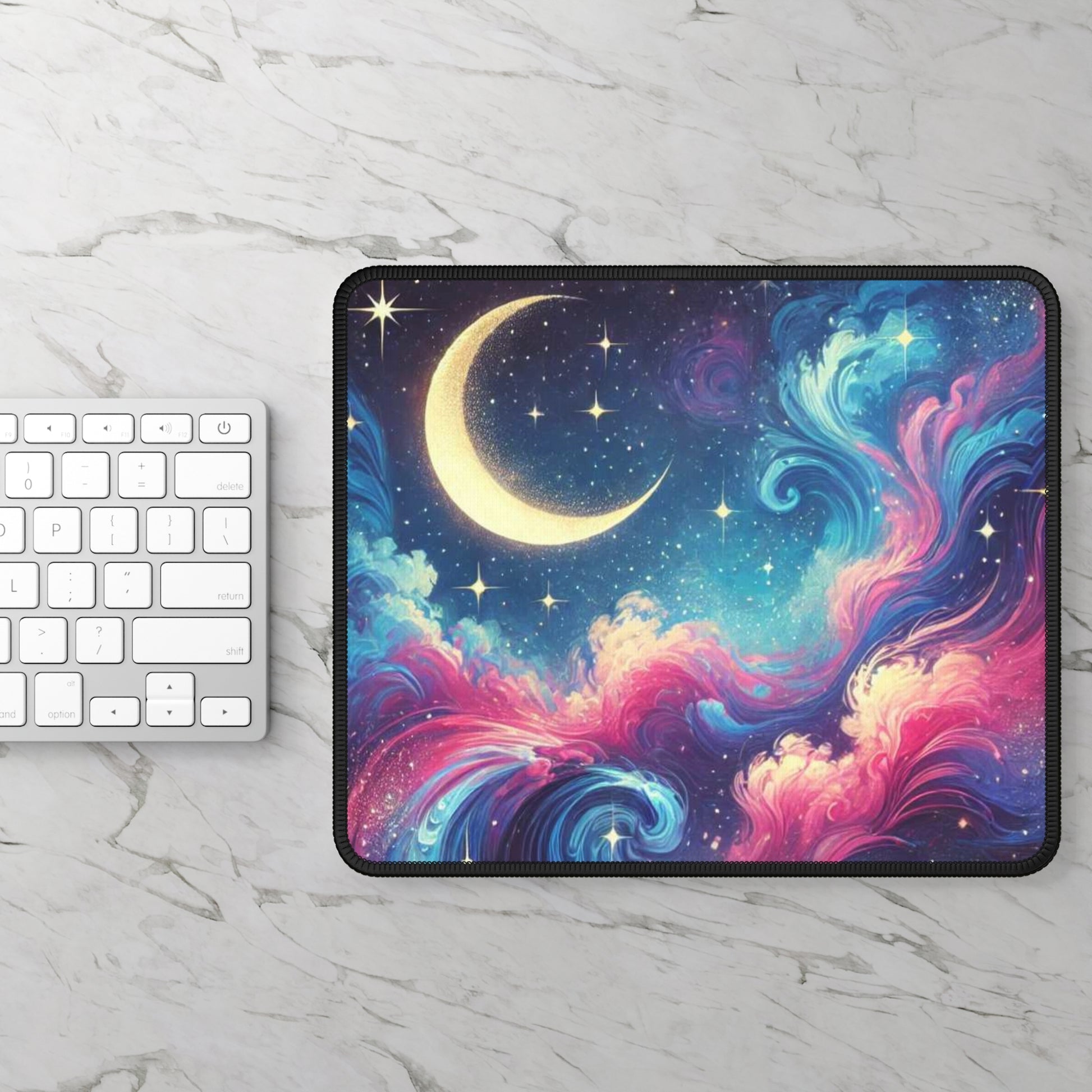 Moon dust gaming mouse pad with colorful cosmic swirl design and crescent moon on marble desk