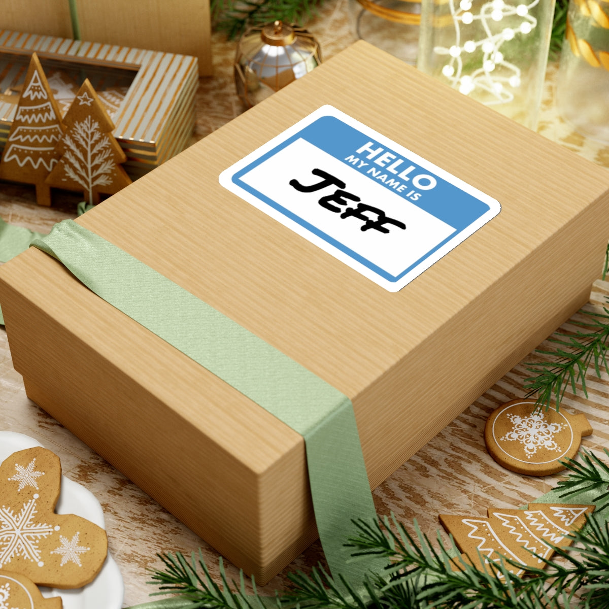 Hello my name is Jeff sticker on a brown gift box with holiday decorations from Printify
