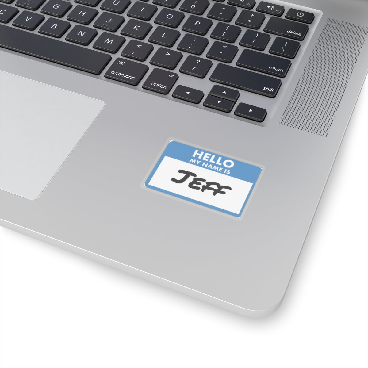 Hello my name is Jeff sticker on silver laptop keyboard area by Printify