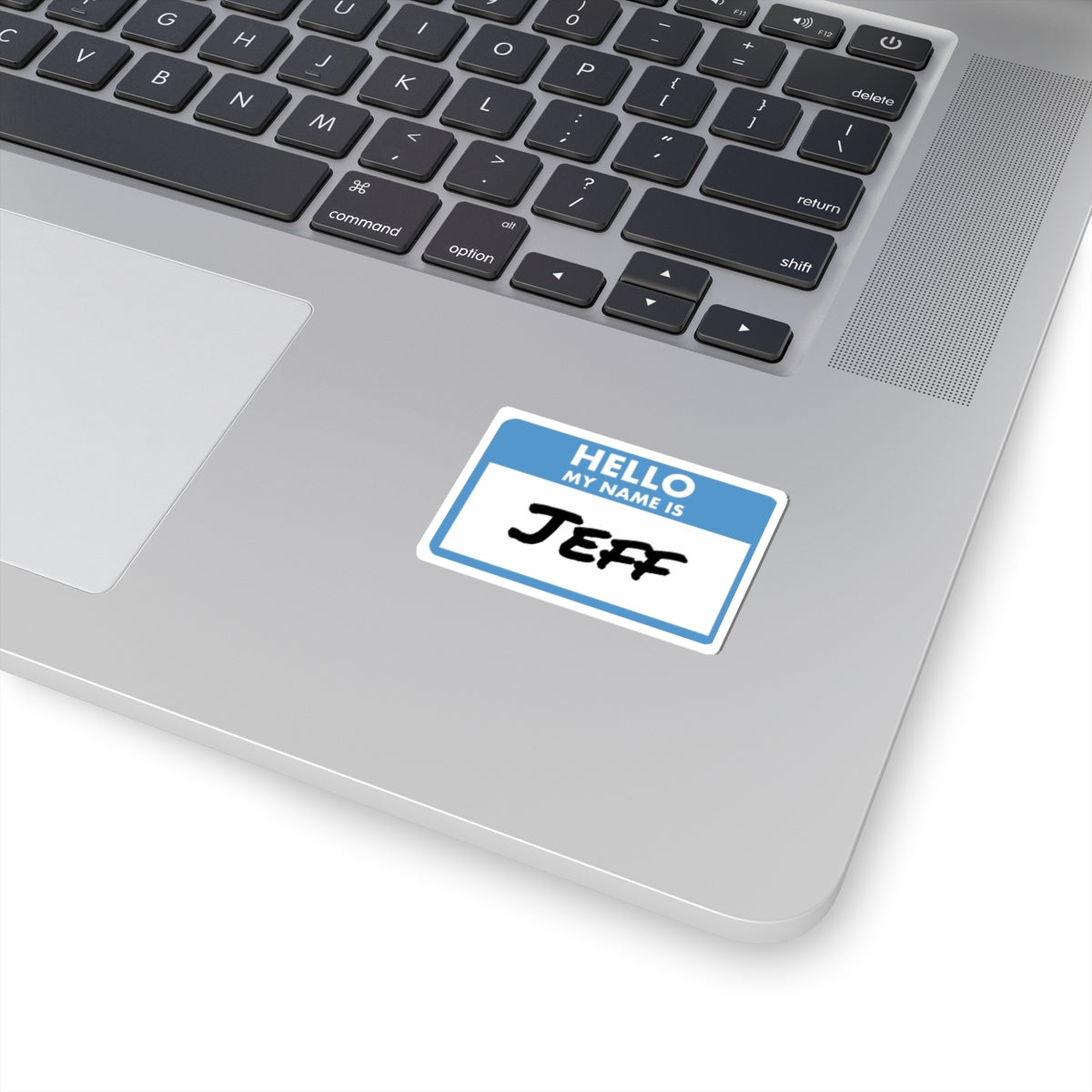 Printify my name is Jeff sticker on silver laptop keyboard deck for personalized paper product