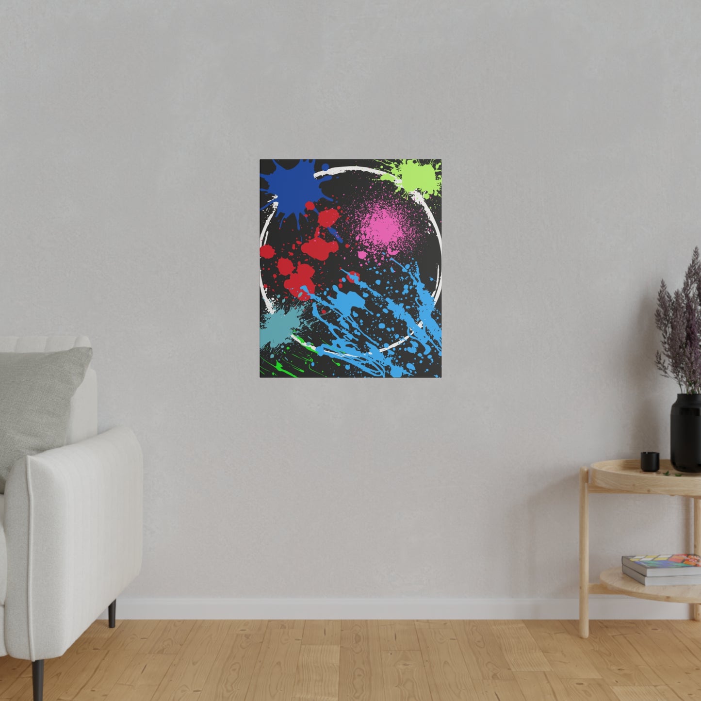 Neon eclipse abstract canvas wall art with colorful splatter design hanging in modern living room