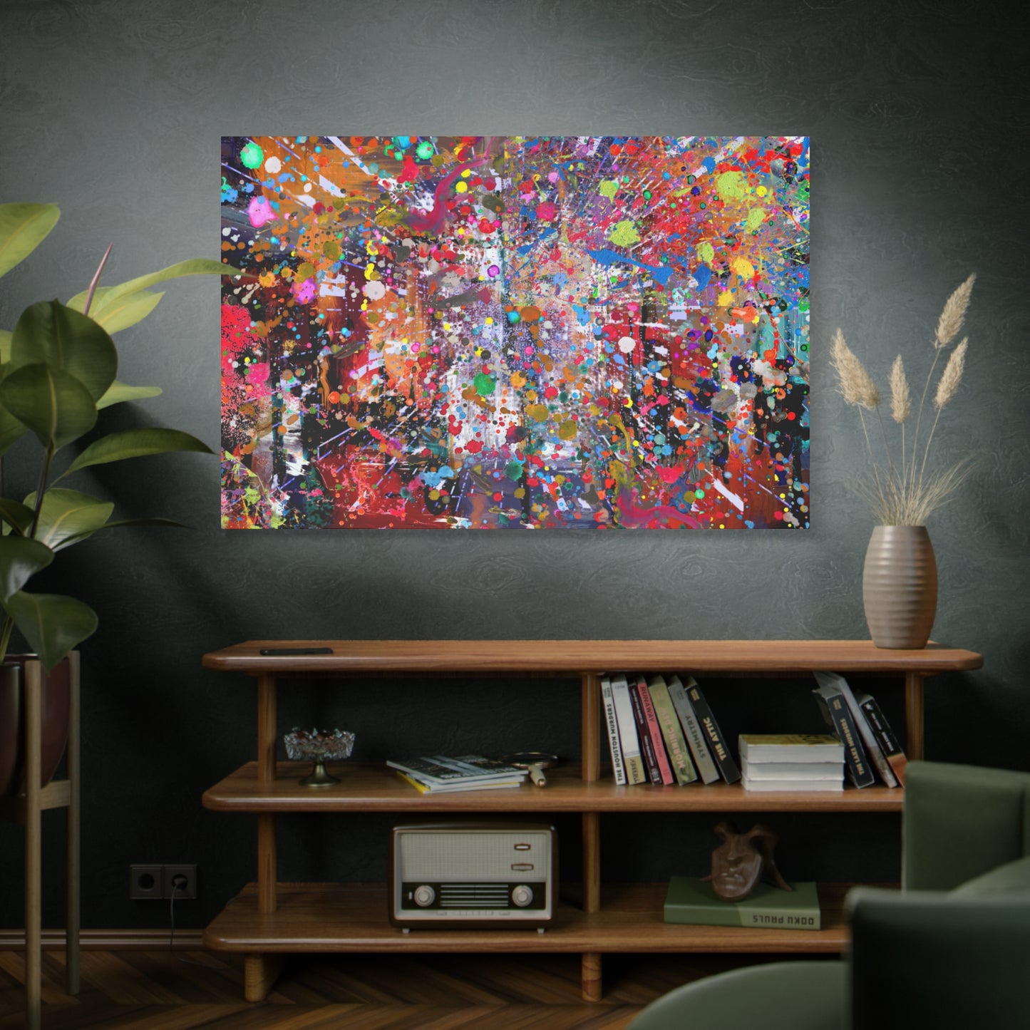 Colorful neon explosion abstract art canvas print displayed on living room wall above wooden shelf