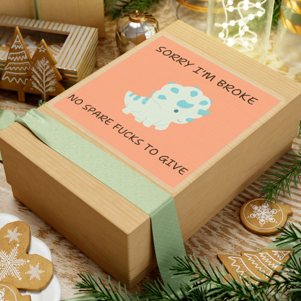 no fucks to give funny dino sticker on a gift box with holiday decorations and cookies