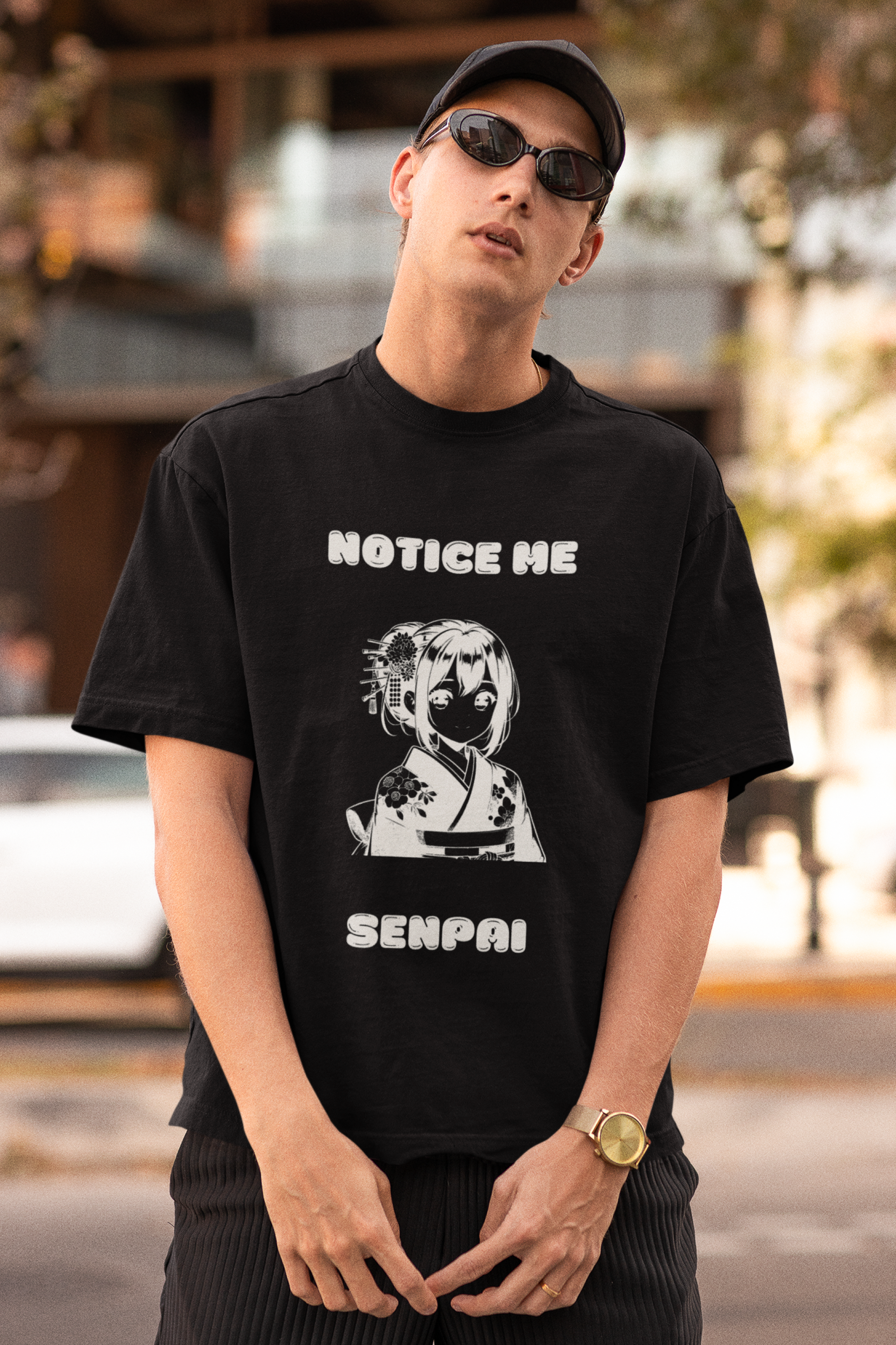 Printify black T shirt worn by male model featuring anime graphic and anime meme notice me senpai clothing for adults