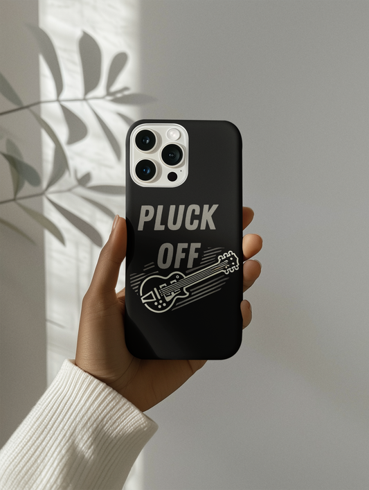 A hand holds the Funny Pun Pluck Off Tough Phone Case, featuring "PLUCK OFF" and an electric guitar graphic. Sunlit leaf shadows in the background highlight its playful, unique design.