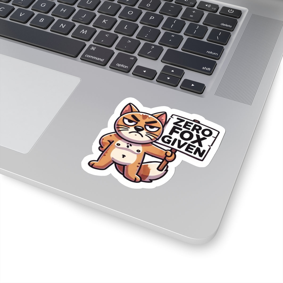 Printify sticker on laptop grumpy cartoon fox holding ZERO FOX GIVEN sign cute sarcastic animal zero fox given pun sticker