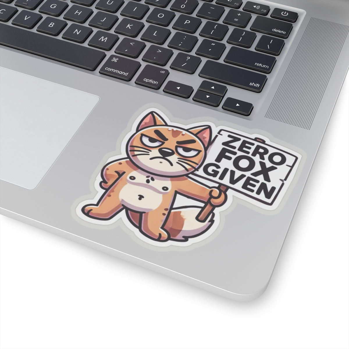 Printify paper sticker of a grumpy fox holding ZERO FOX GIVEN sign on laptop cute sarcastic animal zero fox given pun sticker