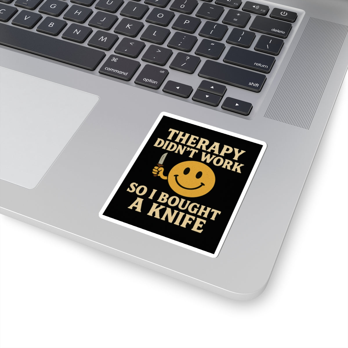 Therapy did not work so i bought a knife dark humor smiley sticker on a laptop surface
