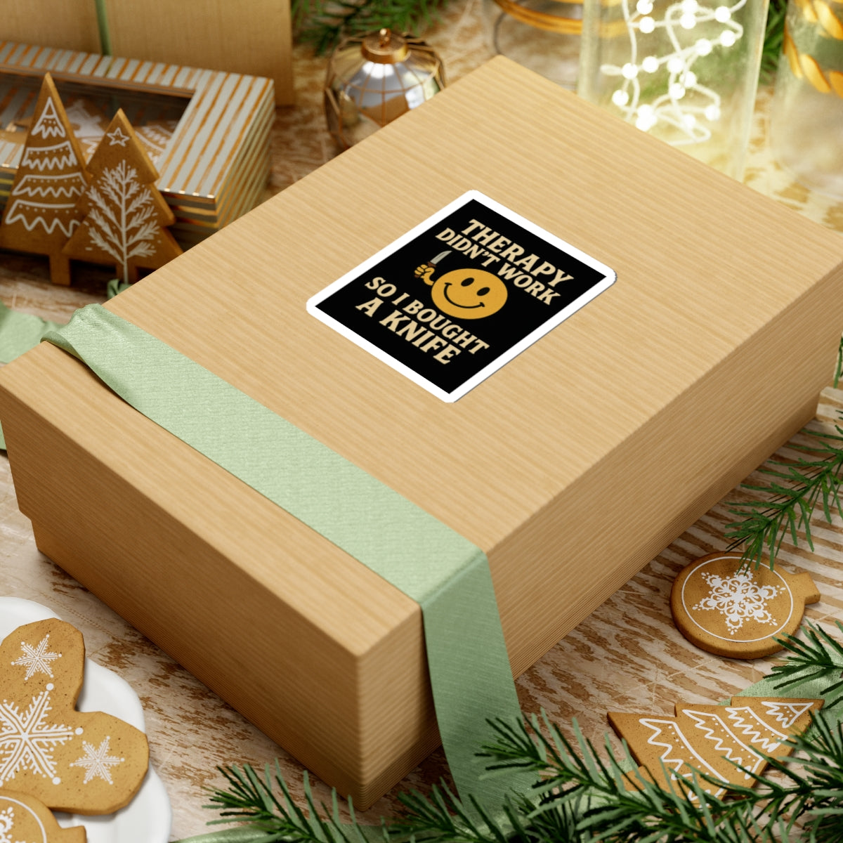Therapy did not work so I bought a knife dark humor smiley sticker on a gift box with holiday decorations