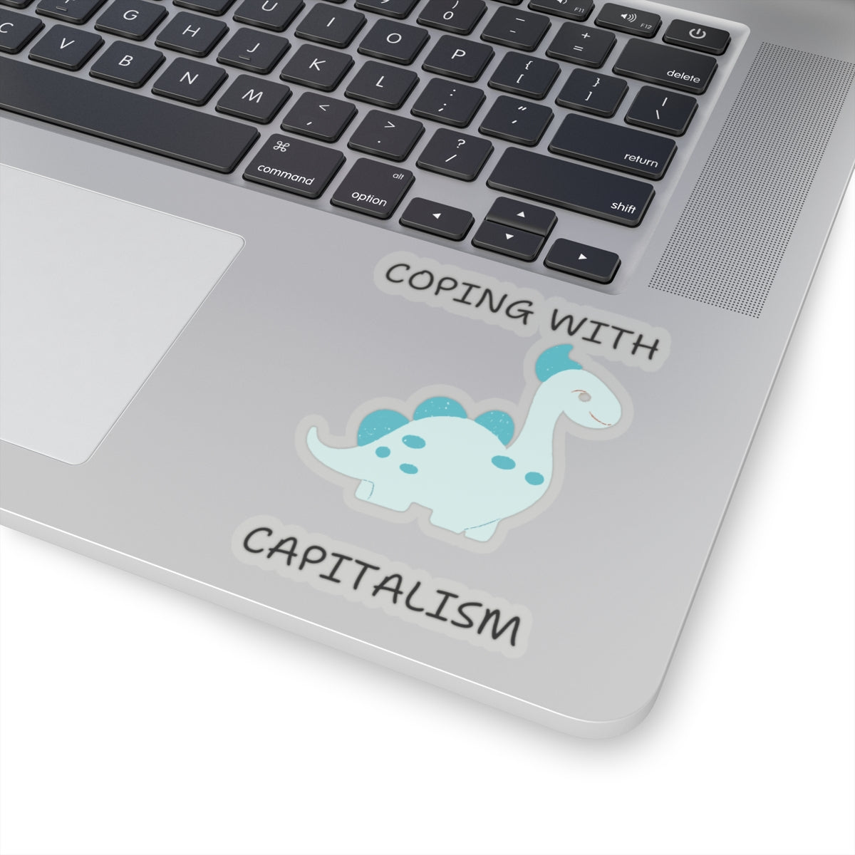 Unique sarcastic cute dinosaur sticker on laptop with text coping with capitalism from Printify