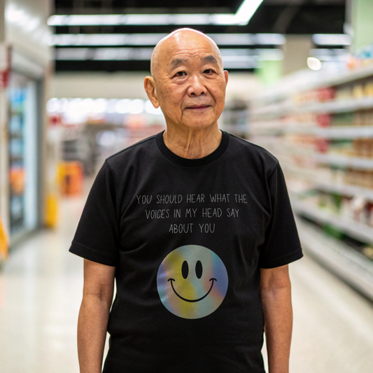 Voices in my head funny smiley face unisex shirt worn by an elderly man in a grocery store aisle